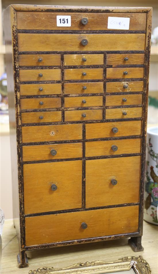 A miniature specimen cabinet